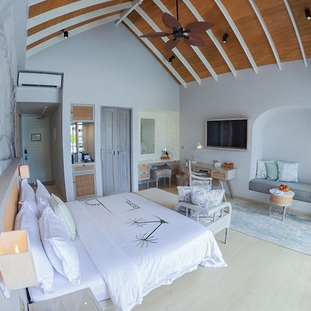 Malahini Kuda Bandos Resort Hulhumale Esterno foto A bedroom at the resort