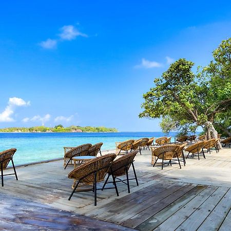 Malahini Kuda Bandos Resort Hulhumale Esterno foto View of the island from the resort