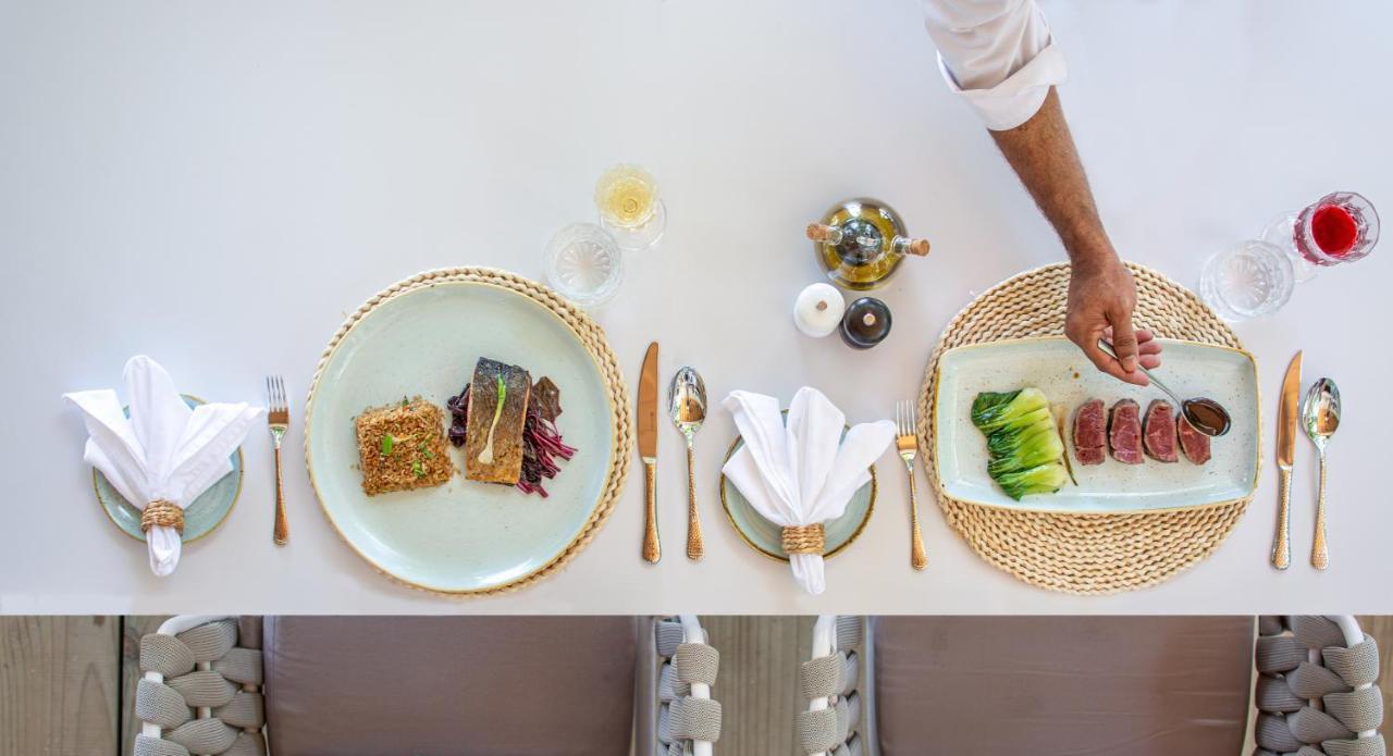 Malahini Kuda Bandos Resort Hulhumale Esterno foto A place setting